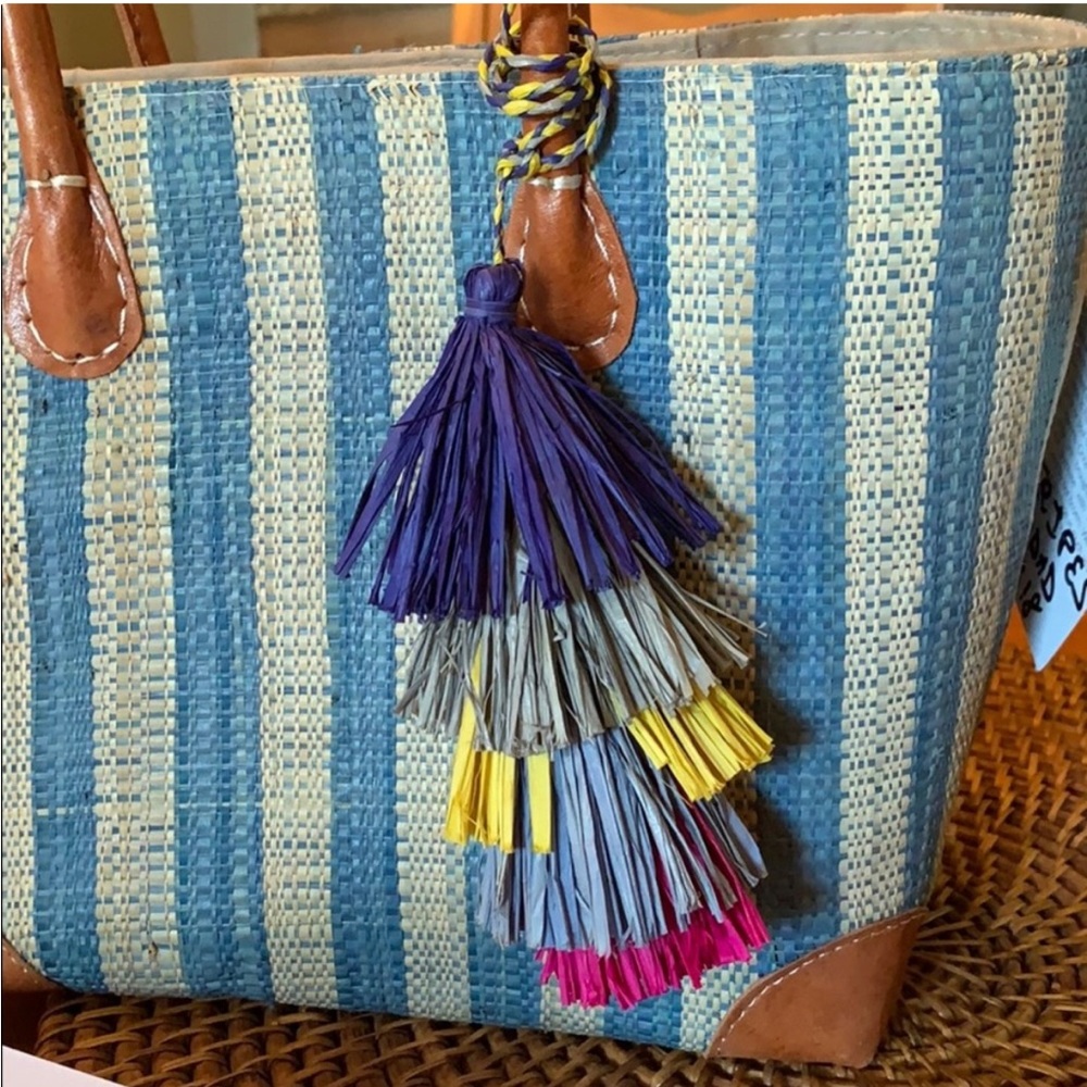 Handmade bag in Madagascar. Drawstring closure. 14L x 6W x 10W